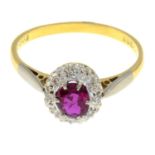 An 18ct gold ruby and diamond cluster ring.Hallmarks for London, 1964.Ring size Q.