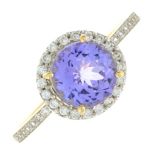 A tanzanite and colourless gem cluster ring.Stamped 585.