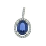 An 18ct gold sapphire and diamond cluster pendant.Estimated total diamond weight 0.15ct.