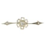 A diamond bar brooch.Length 3.8cms.