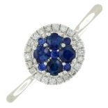 An 18ct gold sapphire and diamond cluster ring.Total sapphire weight 0.36ct.