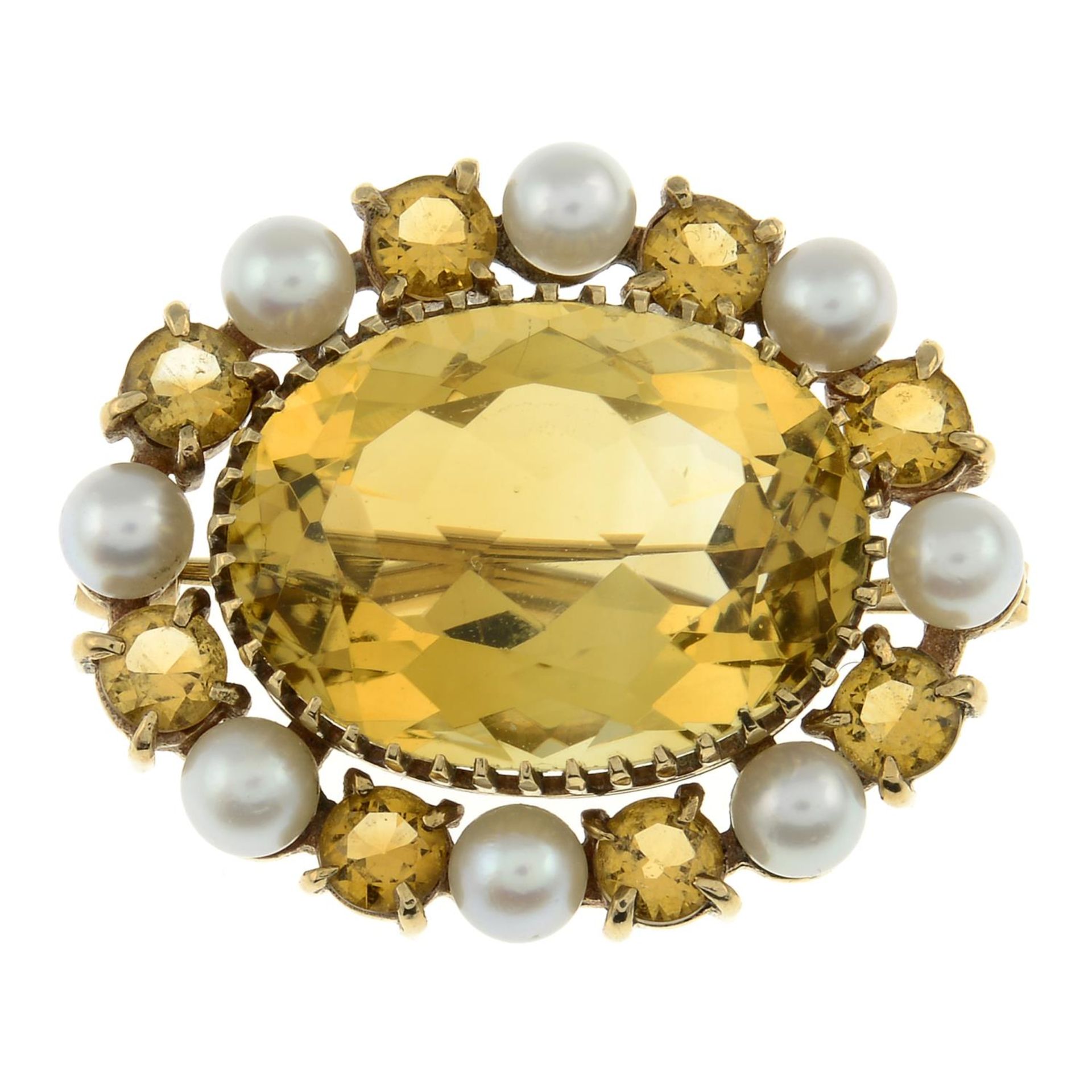 A 9ct gold citrine and cultured pearl brooch.Hallmarks for Birmingham, 1966.Length 3cms.