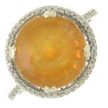 An opal doublet and diamond ring.Estimated total diamond weight 0.25ct.