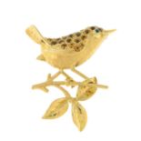 A citrine bird brooch, with green gem eye detail.Length 3cms.