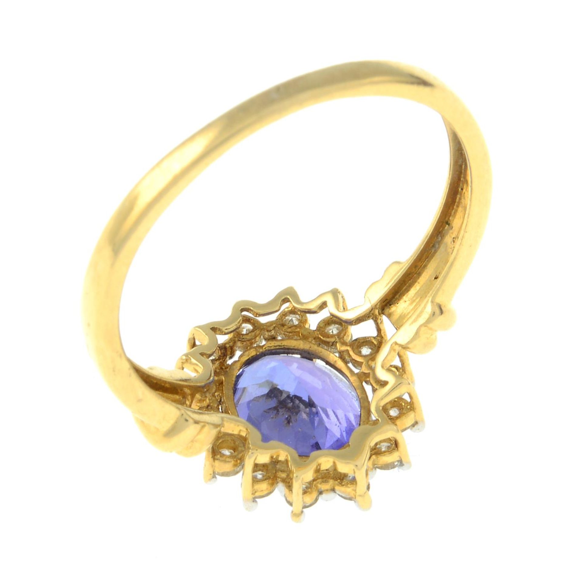 An 18ct gold tanzanite and brilliant-cut diamond cluster ring. - Image 3 of 3