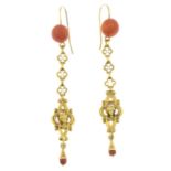 A pair of coral drop earrings.Length 8.8cms.