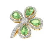 An 18ct gold tsavorite garnet and brilliant-cut diamond four-leaf clover brooch.Total garnet weight