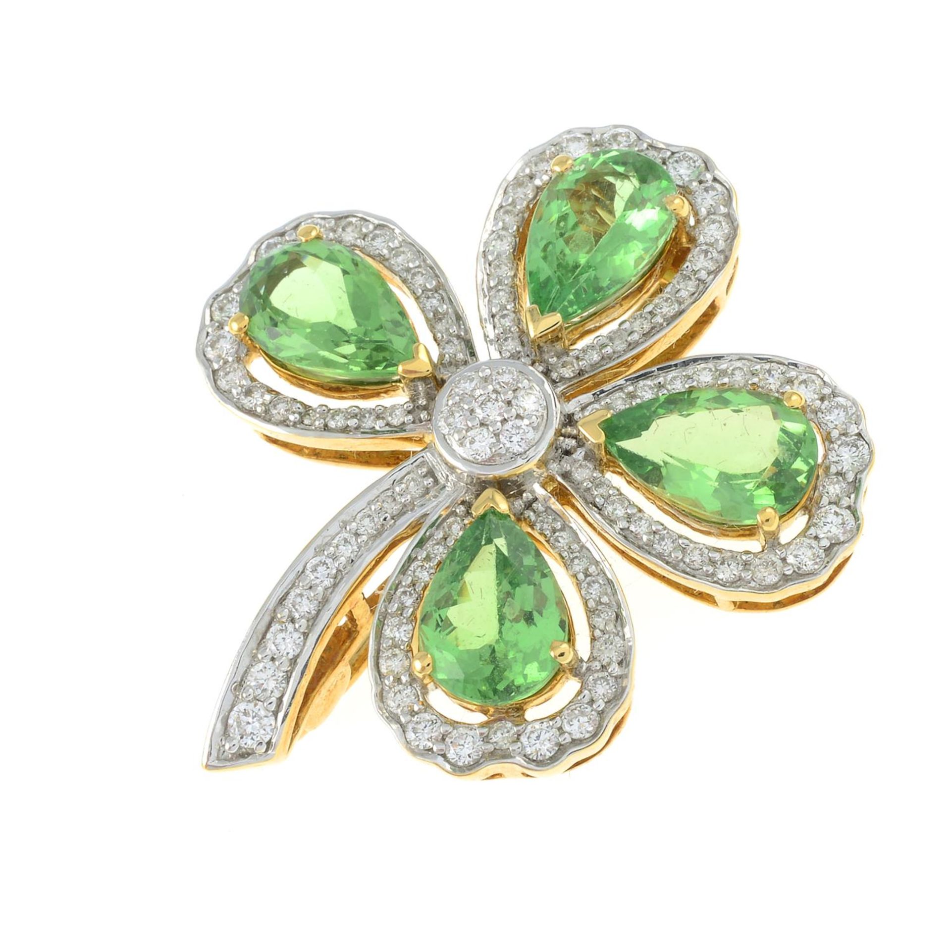 An 18ct gold tsavorite garnet and brilliant-cut diamond four-leaf clover brooch.Total garnet weight