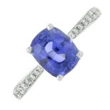 A sapphire and brilliant-cut diamond dress ring.Sapphire weight 2.01cts.Total diamond weight