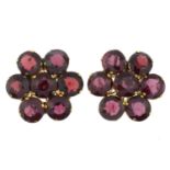 A pair of garnet floral cluster earrings.Total garnet weight 15.54cts,