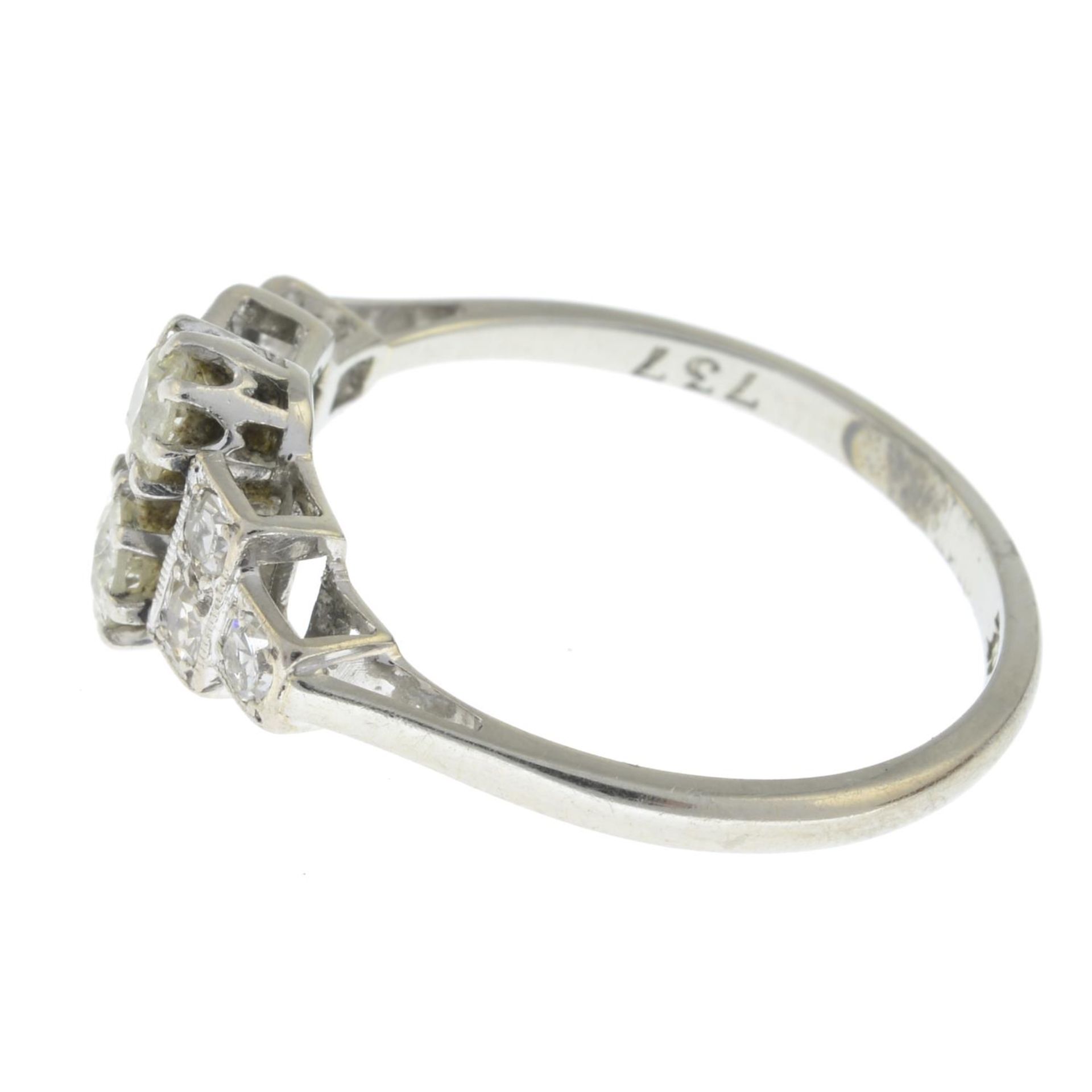 An Art Deco 18ct gold and platinum old-cut diamond two-stone ring, with single-cut diamond sides. - Image 3 of 3