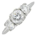 A platinum brilliant-cut diamond three-stone ring.Estimated total diamond weight 0.90ct,