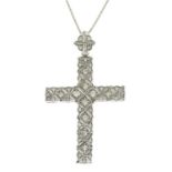 An 18ct gold pave-set diamond cross pendant,