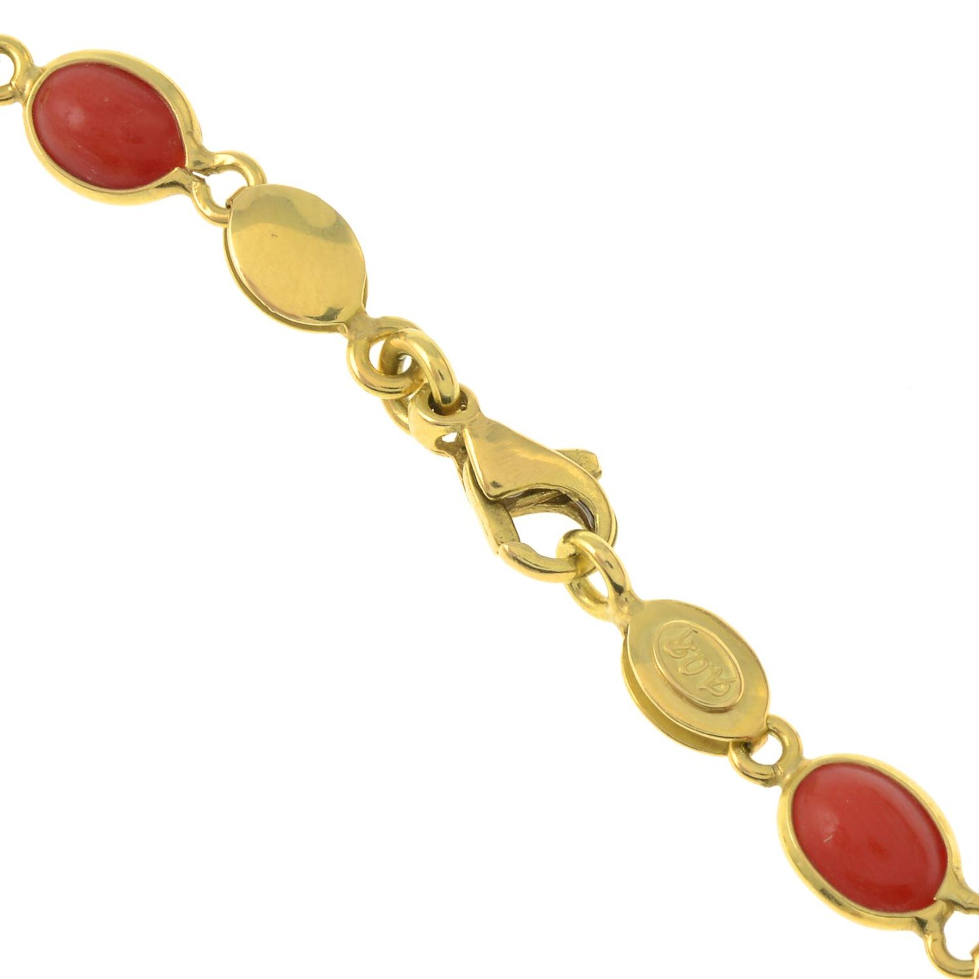 An 18ct gold coral cabochon necklace.Import marks for Sheffield.Length 41cms. - Image 3 of 3