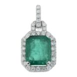 An emerald and brilliant-cut diamond pendant.Emerald weight 2.90cts.Total diamond weight