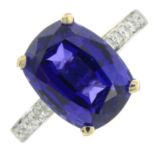 An 18ct gold tanzanite ring, with brilliant-cut diamond sides.Tanzanite weight 6.52ct.