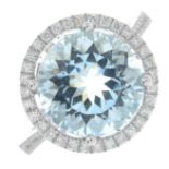 An 18ct gold aquamarine and brilliant-cut diamond cluster ring.Aquamarine weight 4.92cts.Total