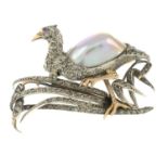 A rose-cut diamond and mabe pearl bird brooch.Total diamond weight 0.60ct.Length 3cms.