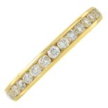 An 18ct gold brilliant-cut diamond half eternity ring.