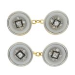 A pair of 18ct gold diamond and gem-set cufflinks.AF.Estimated total diamond weight 0.20ct.Stamped