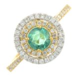 An 18ct gold emerald and brilliant-cut diamond dress ring.Emerald weight 0.48ct.Diamond weight
