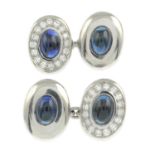 A pair of sapphire cabochon and brilliant-cut diamond cufflinks.Estimated total diamond weight