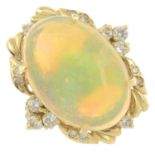 An opal cabochon and brilliant-cut diamond ring.Estimated opal dimensions 18.5 by 13 by