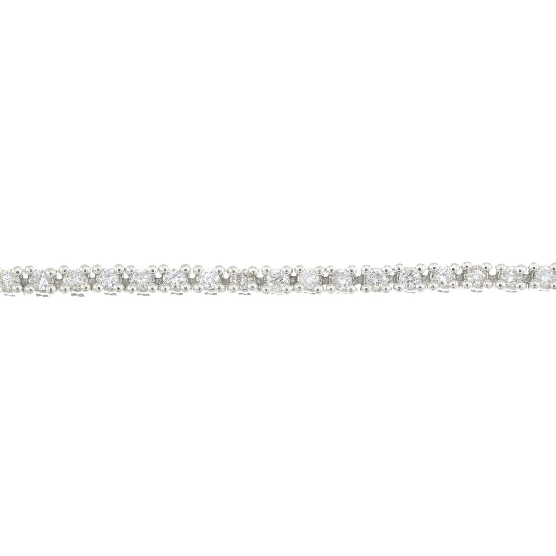 A 9ct gold brilliant-cut diamond line bracelet.Total diamond weight 1ct,