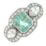 An emerald and vari-cut diamond dress ring.Emerald calculated weight 1.56cts,