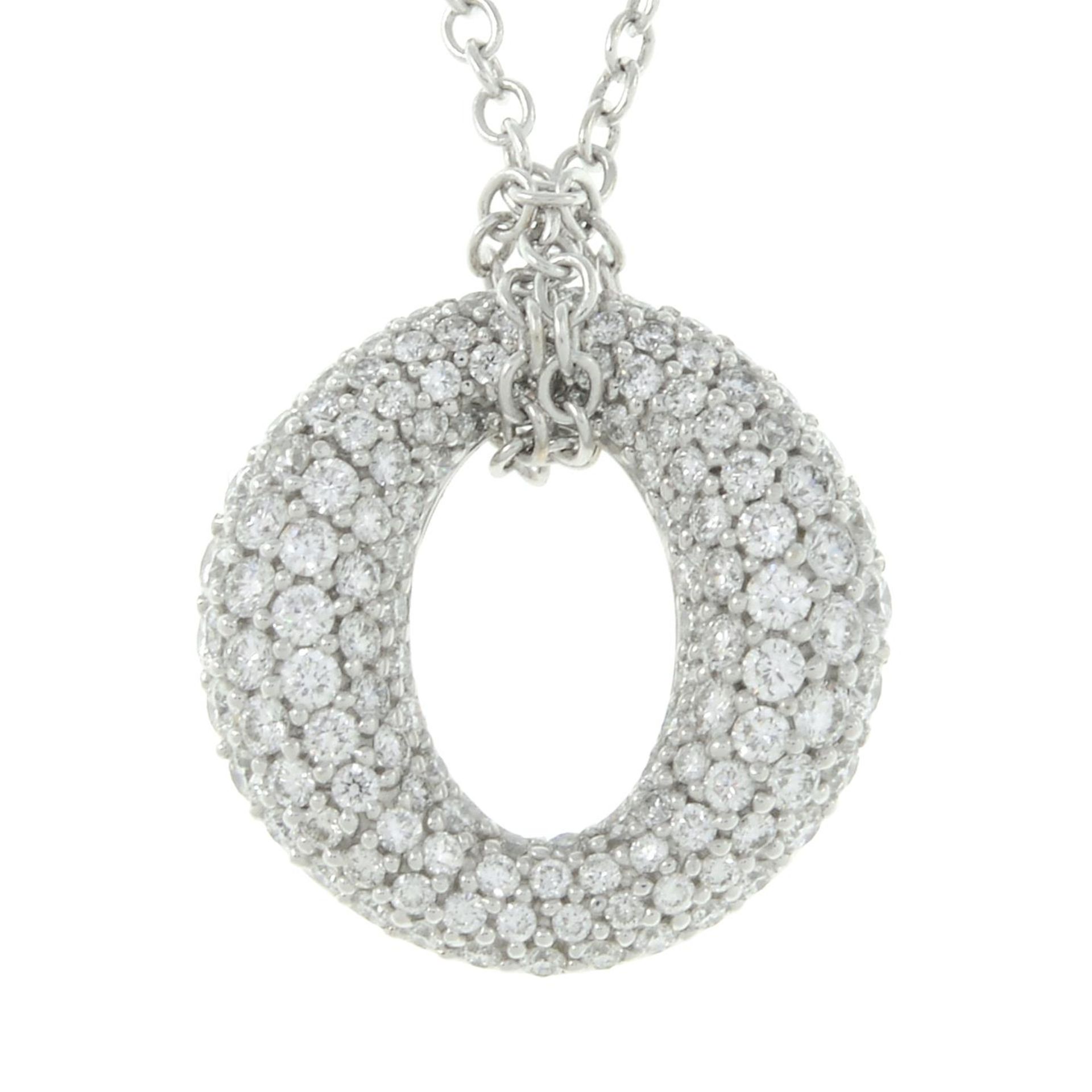 An 18ct gold brilliant-cut diamond pendant,