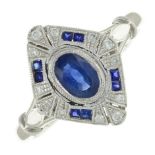 A sapphire and pave-set diamond dress ring.Total sapphire weight 0.60ct,