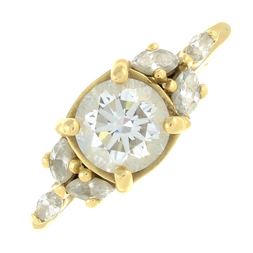 A 14ct gold vari-cut diamond dress ring.With report 341884572,