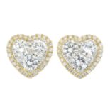 A pair of 18ct gold pavé-set diamond heart-shape cluster earrings.Total diamond weight 1.47cts,