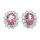 A pair of 18ct gold pink tourmaline and brilliant-cut diamond cluster earrings.Total tourmaline