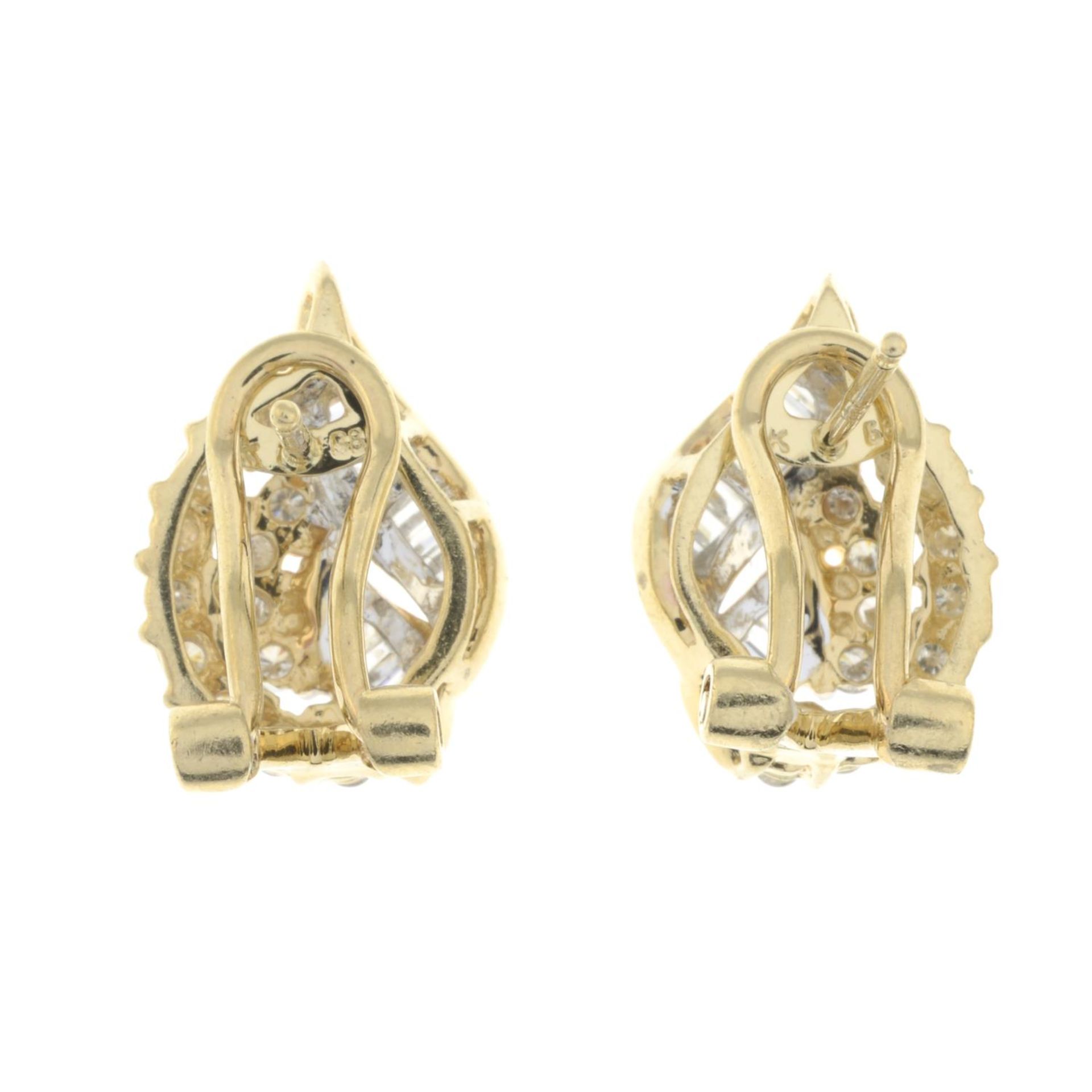 A pair of vari-hue diamond earrings.Estimated total diamond weight 1ct, - Image 2 of 3