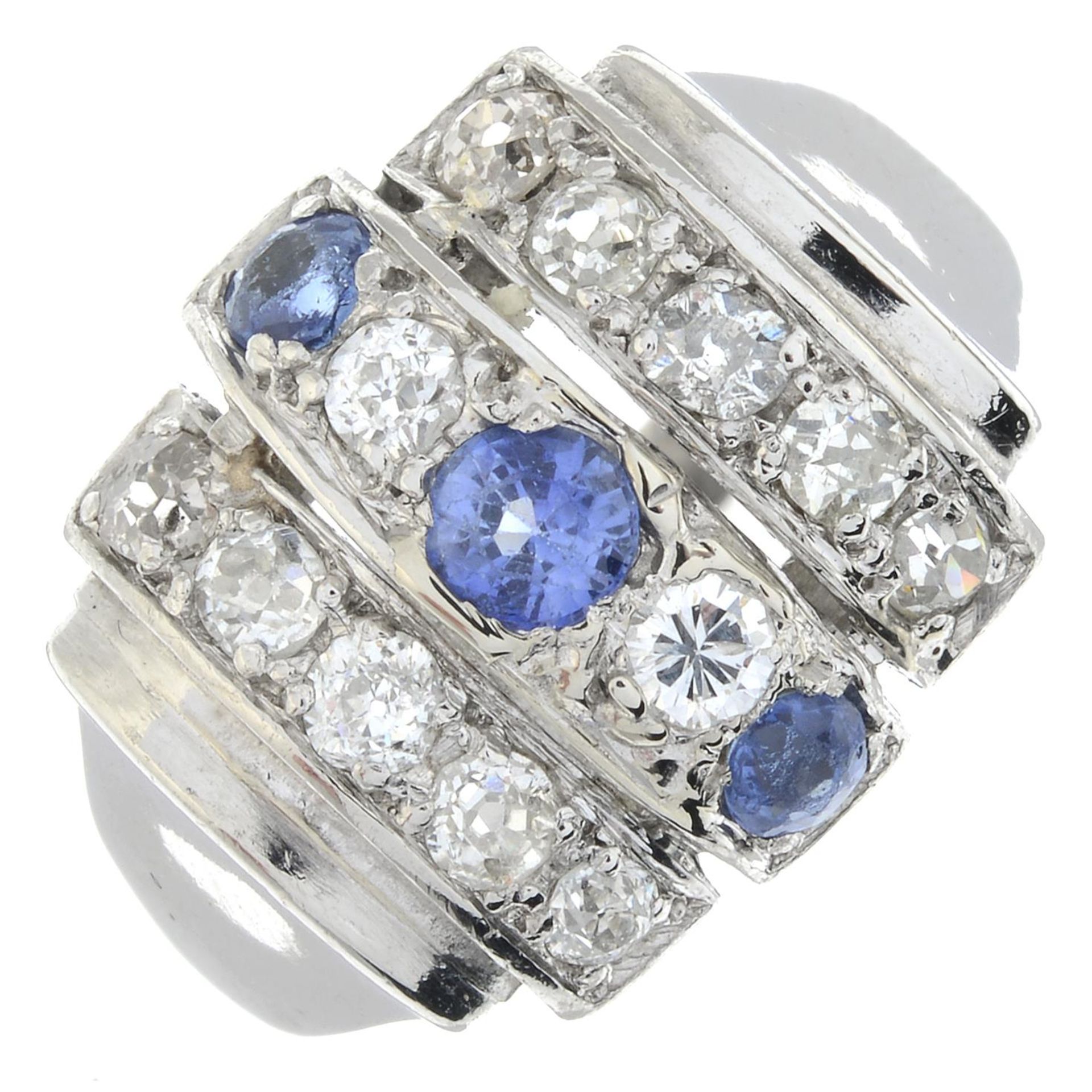 A sapphire and old-cut diamond dress ring.Estimated total diamond weight 0.65ct.Stamped PLAT.Ring