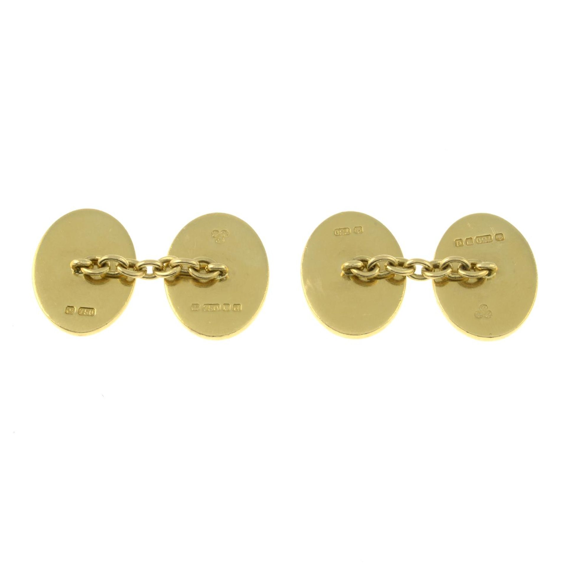 A pair of 18ct gold engraved cufflinks.Hallmarks for London, 2003.Length of cufflink face 1.8cms. - Image 2 of 2