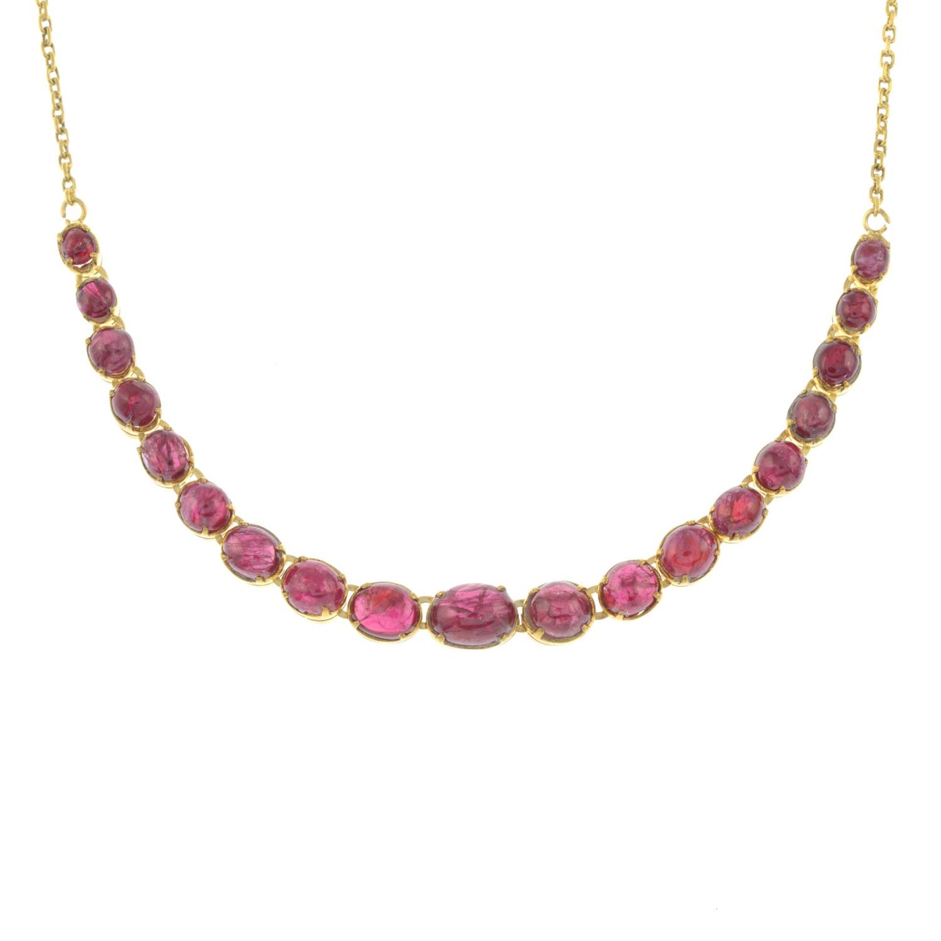 A graduated ruby cabochon necklace.Length 43.5cms.
