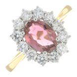 An 18ct gold pink tourmaline and brilliant-cut diamond cluster ring.Pink tourmaline 1.31cts.Diamond