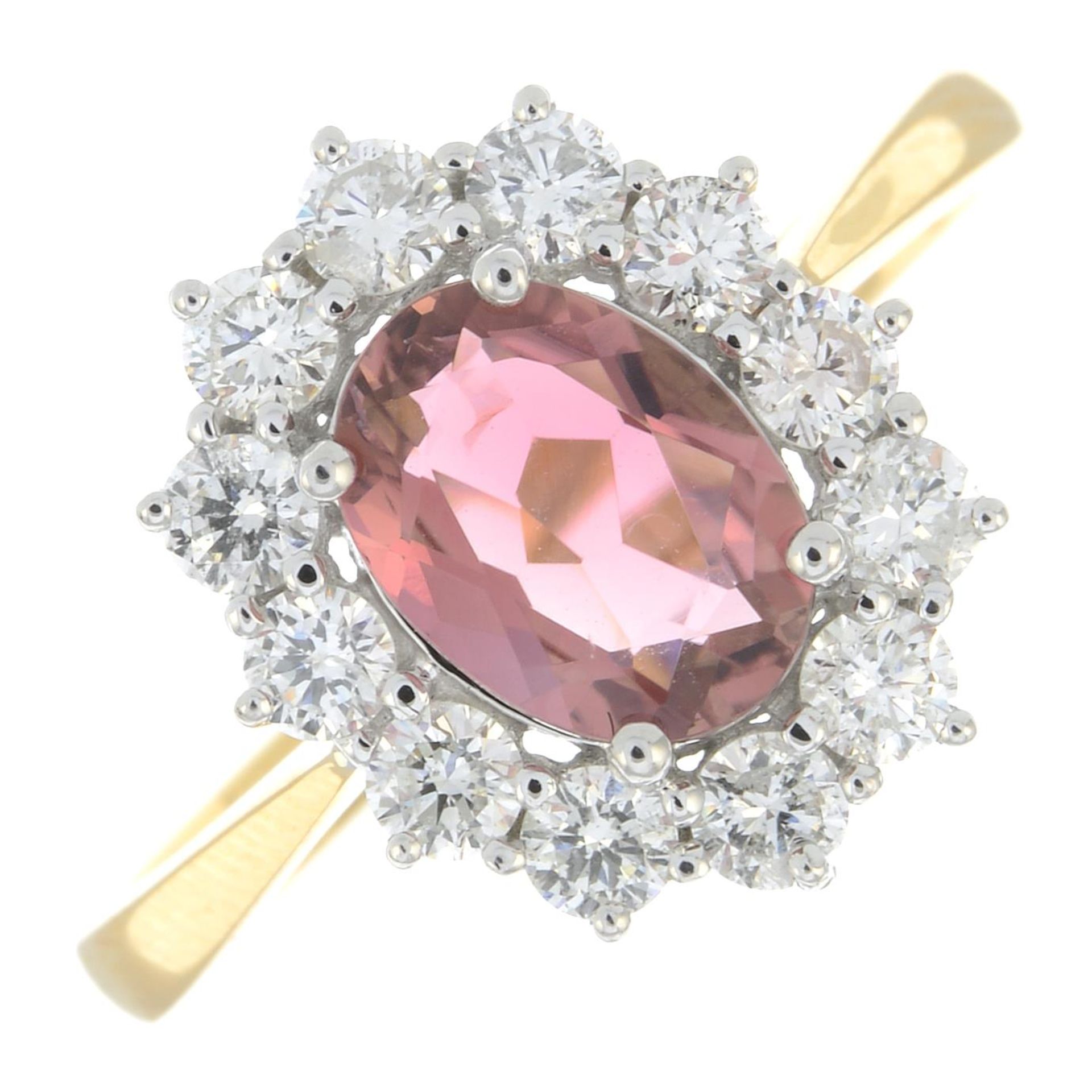 An 18ct gold pink tourmaline and brilliant-cut diamond cluster ring.Pink tourmaline 1.31cts.Diamond