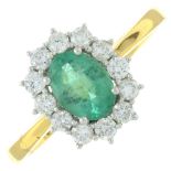 An 18ct gold emerald and brilliant-cut diamond cluster ring.