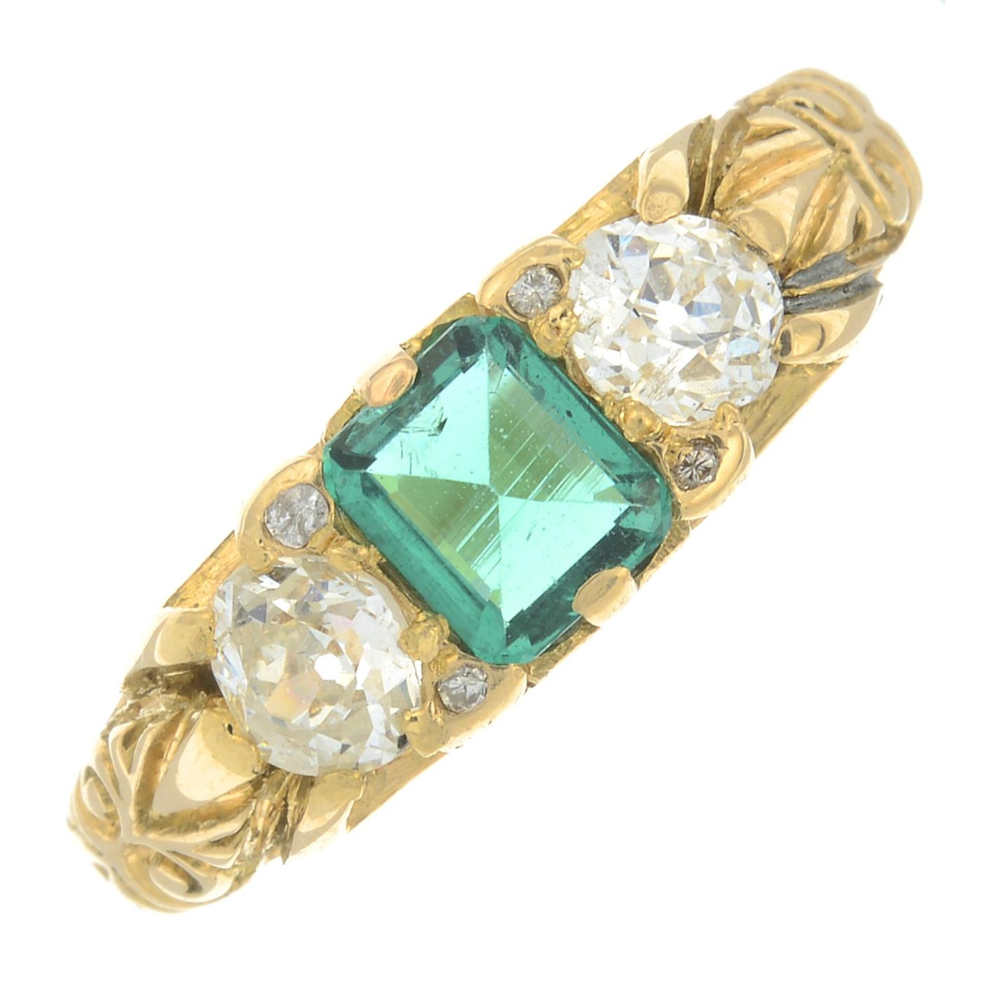 An old-cut diamond and emerald three-stone ring,