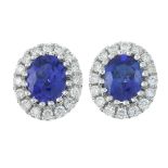A pair of 18ct gold sapphire and brilliant-cut diamond earrings.Total sapphire weight 1.13cts.Total