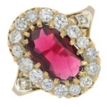 A red spinel and brilliant-cut diamond cluster ring.