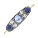 A sapphire cabochon and old-cut diamond dress ring.Estimated total diamond weight 0.20ct,