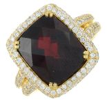 An 18ct gold garnet and brilliant-cut diamond cluster ring.Garnet calculated weight 8.66cts,