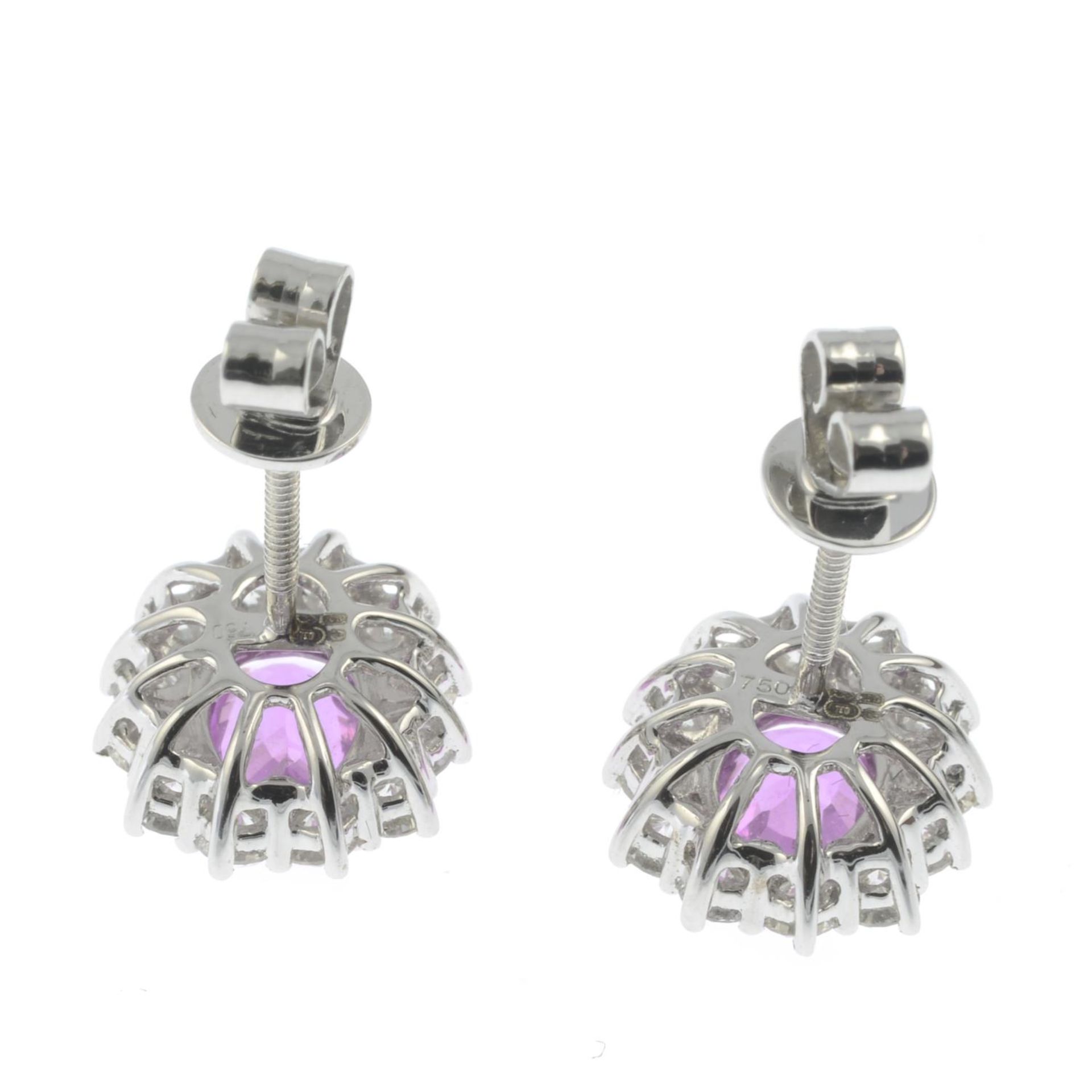 A pair of 18ct gold pink sapphire and brilliant-cut diamond cluster earrings.Total diamond weight - Image 2 of 2