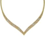 A 9ct tri-colour gold necklace.Import marks for London, 1980.Length 40.5cms.