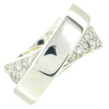 A pave-set diamond crossover dress ring.Estimated total diamond weight 0.65ct.