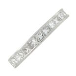 A platinum rectangular-shape diamond full eternity ring.Estimated total diamond weight 1.80cts.